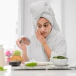 Best moisturizer for oily skin - woman applying skincare cream